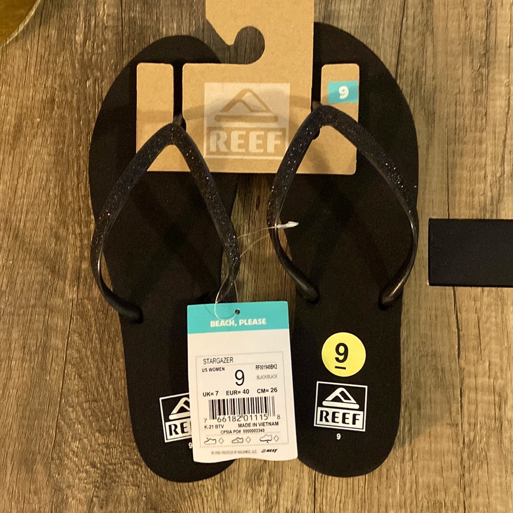Reef black sparkle flip flops